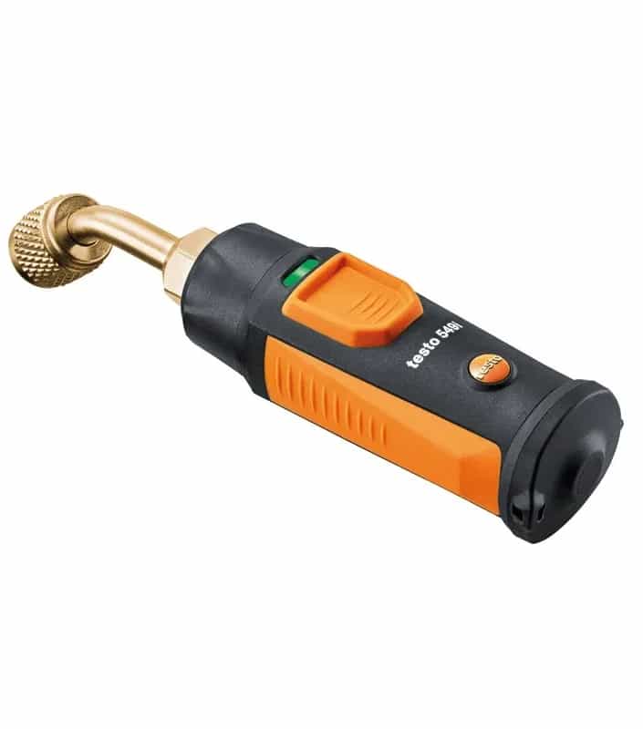 Manometr Testo 549i w ujęciu pod kątem — widoczny zielony wskaźnik statusu i pomarańczowy przycisk obsługi (miniatura)